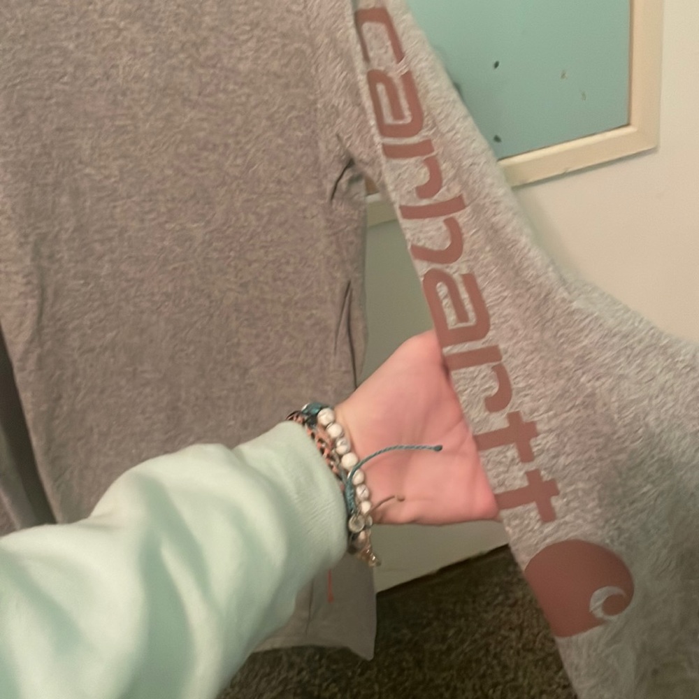 gray and tan carhartt long sleeve t-shirt.